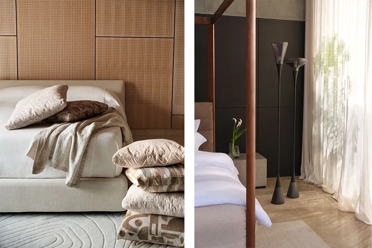 A bedroom with perforated oak wall panelling behind a linen bed, and dark timber cabinetry next to a sheer curtain